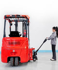 Heavy Duty Full Electric Pallet Jack With 4400 Lb Capacity And 48V Lithium Battery Built For Tight Indoor Spaces featuring a user operating it.