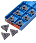 Check Out These 10 Pc Indexable Carbide Lathe Tools With Tough TNMG160408 Inserts And A Super Sharp Edge That Rocks On Stainless Steel Plus Heavy Duty Hard Alloy Turning Blades For All Your Metal Fabrication Jobs. Image features TNMG cutting inserts in a blue storage case.