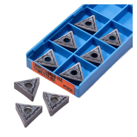 Check Out These 10 Pc Indexable Carbide Lathe Tools With Tough TNMG160408 Inserts And A Super Sharp Edge That Rocks On Stainless Steel Plus Heavy Duty Hard Alloy Turning Blades For All Your Metal Fabrication Jobs. Image features TNMG cutting inserts in a blue storage case.