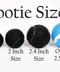 Footie sizes comparison including golf ball, 2 inch, 2.4 inch black, and 2.5 inch blue tennis ball for reference.