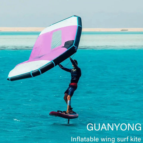 Person using Inflatable Wing Foil Surf Wing With Storage Bag And Leash For Wind Wing Foiling Surfing Snow Ski Surfing And Water Play Ultimate Go To Durable Lightweight Handheld Kite Wing With Dual Airbag Safety on water