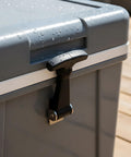 Close-up of 4 Pack T Handle Draw Latches with rubber flexible hasp on outdoor toolbox, showing sturdy carbon steel and corrosion resistant closure.