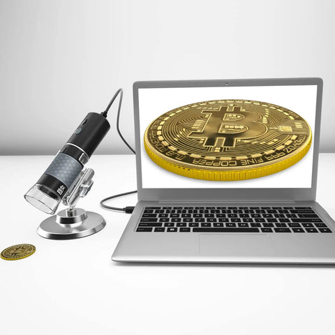 4K Wireless Digital Microscope Handheld HD USB Inspection Camera Endoscope With Stand, 50x To 1000x Magnification, Compatible With iPhone iPad Android Phone Tablet Windows Mac, Live View, Zoom, And Precise Micro Inspections. Handheld microscope on stand beside laptop showing coin close-up.