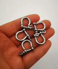 Built Like A Tank Marine Grade 316 Stainless Steel Bow Shackles 3Mm Mini Links in hand for paracord crafts, five pack.