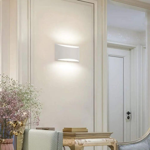 Aluminum Modern LED Wall Sconce Set Of 2 Dope Hardwired Up And Down Wall Mount Lights in living room with cool white glow