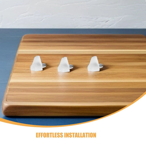 Stainless Steel Shelf Support Pins And 200 White Plastic Pegs Set displayed on wooden board, highlighting easy installation.