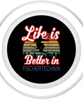 Life Is Better In Fischertechnik PopGrip For MagSafe Ski Edition, black round phone grip with skier graphic
