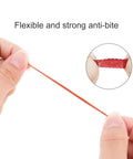 Hands stretching red worm from 250 Piece Soft Plastic Fishing Worms Lures Set Realistic Earthworm Baits For Freshwater Fishing