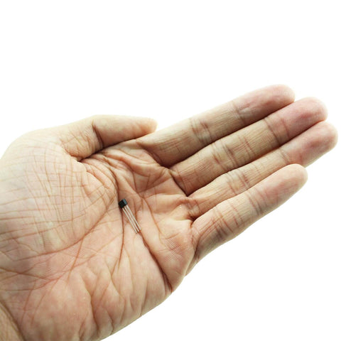 Hand holding Premium Linear Hall Effect Sensor Pack 49E OH49E SS49E S49E three-pin in black housing for current sensing