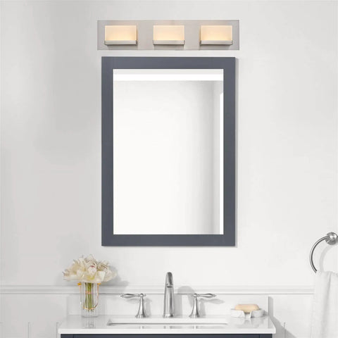 Everett 24 Inch Modern 3 Light Integrated LED Vanity Light With Brushed Nickel Finish Dope Warm White Glow in bathroom setup