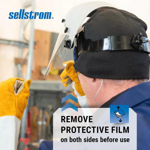 Worker wearing Advantage Face Shield With Crown And Ratchet Headgear for Grinding and Cutting, removing film, side view.