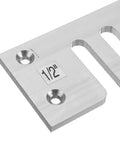 Close-up of Real Deal Aluminum Dovetail Router Template Kit showing engraved measurements and precision slots.