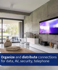 Modern living room setup with a TV, illustrating the use of 14 Inch Wireless Structured Media Center Enclosure White No-Fuss With WiFi