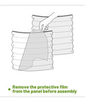 Illustration showing protective film being removed from panel of Two Pack Raised Garden Bed Kit Made From Galvanized Steel For Outdoors
