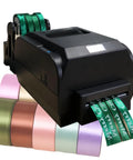 Professional Satin Ribbon Printer Machine For Custom Label Creation printing green satin ribbon with various colored rolls.