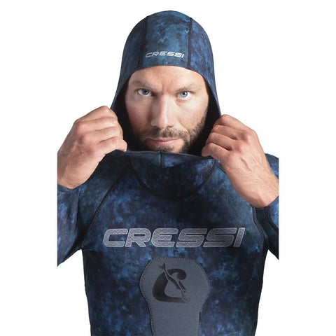 Model wearing 2mm Hooded Wetsuit 2-Piece Nylon Camouflage Blue For Spearfishing And Freediving, showing hood and logo, Size 2XL