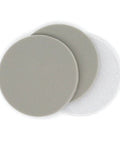 Six Pack 5 Inch Sponge Sanding Discs With Peel And Switch Backing For Easy Swap and Dust Vent Holes To Keep Your Workspace Clean While Polishing Or Grinding Wood Metal Or Plastic At Any Grit Level, showing three grey and white discs.