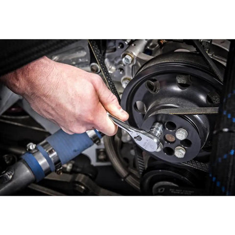Mechanic using Three Eighths Inch Drive Six Point SAE Socket Set, Thirteen Piece, Nickel Chrome Plated Alloy Steel on engine