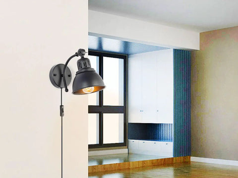 Set Of 2 Black Plug In Wall Sconces Industrial Style With On Off Cord Switch mounted in modern living room.