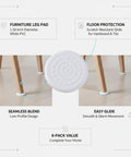 Image showing Eight Pack White Square Furniture Leg Pads 1.18 Inch PVC Floor Protectors under chair legs on hardwood floor.