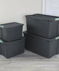 Heavy Duty 24 Pack 20 Gallon Stackable Plastic Storage Bins With Secure Latch Lock Tops in gray, ideal for garage sorting.