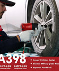 1/2 Inch Aluminum Air Impact Wrench Set Heavy Duty Beefy 1380 Ft Lbs Twin Hammer used for tire removal with a mechanic.