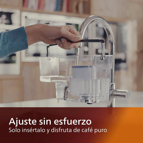 Person installing AquaClean Calc And Water Filter For Your Coffee Maker Keeps Descale At Bay For Up To 5,000 Cups Reduces Limescale Build Up Micro Porous Filtration Includes 2 Filters Compatible under a kitchen tap.