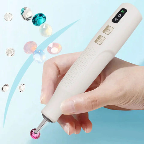 Badass Cordless Electric Pickup Pen With Reliable Vacuum Grip To Snag Loose Bits Zero Sweat For Desk Projects Plus Bright Light and Smooth Angled Tip For Crisp Workflows held in hand with shiny gems.