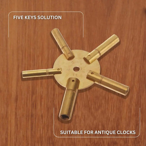 5 Prong Brass Clock Key For Winding Clocks With Odd Numbers Handy Universal Key Set shown on wooden background.