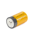 Top Shelf D Cell Batteries 12 Pack Alkaline Power Cells One Point Five Volt, single alkaline D battery showing positive terminal.