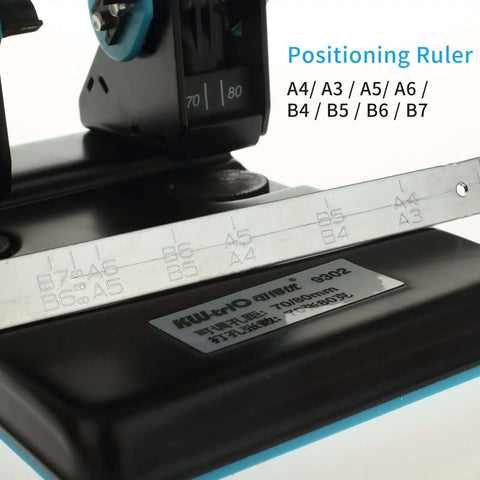 Close-up of 2 Hole Paper Punch with Adjustable 70mm or 80mm spacing and 6mm hole, featuring position ruler for A4 A3 A5 A6 B4 B5 B6 B7 papers