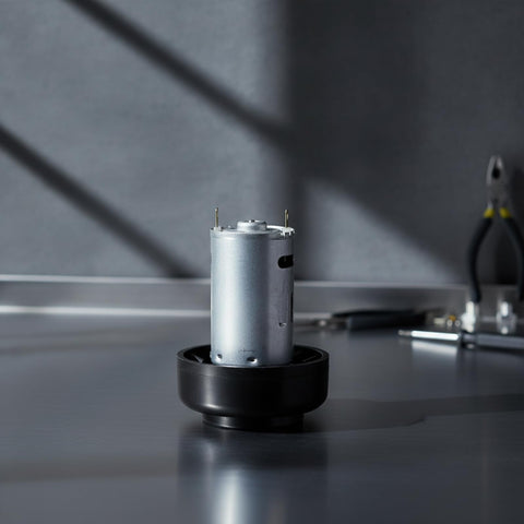 Heavy Duty Micro DC 390 High Speed Electric Motor For Vacuum Cleaner Upgrade, compact metal assembly on a work surface.