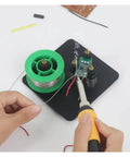 Pro Grade Magnetic Soldering Station With Flexible Third Hand Bracket in use for electronics repair on board