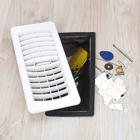 Floor Vent Trap Mesh Covers For 4x10 Floor Registers Pack Of 5 Debris Catchers next to collected debris including coins and keys.
