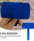 Killer Rubber Wood Graining Paint Roller For Real Deal Faux Finish Wall Texture Job With Extra Long Handle to Keep Your Gear Clean and Slap Down Reusable DIY Painting Solutions Smooth, blue rubber, held in hand.