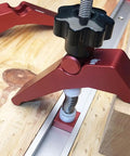 Rock Solid Aluminum T Track Hold Down Clamps For Woodworking And Metalworking Projects Plus Quick Slide In T Slot Press Clamps securing wooden workpieces.