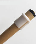 White POM Shaft Collet Sleeve for Pool Cues Lathe Accessory and Cue Building Tool for Makers and Cue Repair Pros installed on cue