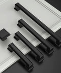 Matte Black 5 Inch Cabinet Pulls 10 Pack With 128mm Hole Centers Durable Kitchen Cabinet Hardware on display with cupboard door