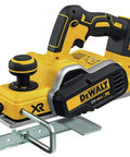 Pro Grade 20V Max Xr Brushless Cordless Planer Drops Dead Serious Amps For Zero Drag Wood Planing And Cabinet Refinishing Job Site Ready Tool Only Renewed angled view of the yellow cordless planer with depth adjustment knob.