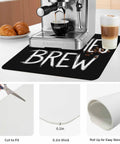 Spooktacular Black Witches Brew Coffee Station Mat Featuring Quick Dry Absorbent PU Material Designed For Kitchen Counter Espresso Machine Setup 28 By 18 Inch Halloween Spill Proof Drip Catch Pad under espresso maker with coffee.