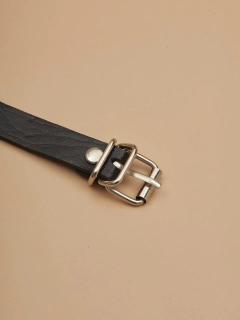 Close-up of the buckle on the Badass Black Pu Leather Waist Chain Belt Featuring Heavy Duty Hardware And Distressed Details.
