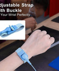 Adjustable anti-static wrist strap with buckle for grounding outlet plug with anti-static wrist strap and grounding wire for ESD safe computer work.