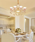 Stunning European Crystal Chandelier Featuring Pink Flower Accents Warm Led Ceiling Pendant Light Luxe Fixture For Living Room Or Hotel With Adjustable Chain To Slay Your Space Decor, elegant dining room setting.