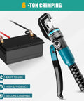 6 Ton Hydraulic Crimping Tool With 9 Die Pairs For 12 AWG To Two Zero Battery Cable Lugs And Wire Rope Crimper Heavy Duty Electrical Crimping For Welding Cables And Battery Cabling Pro Grade next to a battery