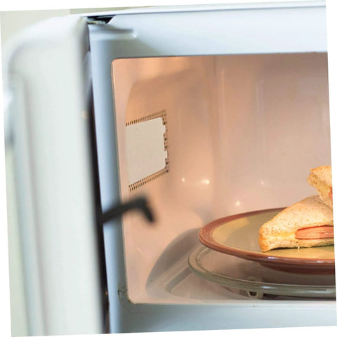 Interior of microwave with 10 Pieces Microwave Waveguide Mica Sheets Heat Resistant Insulation Covers For Oven Cavity Walls visible on side