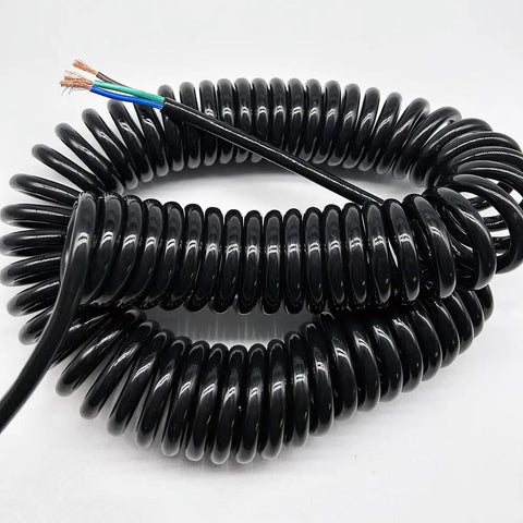 Heavy Duty Three Core Telescopic Extension Cord Self Retracting Power Cable with Beefy Protective Jacket coiled for easy storage.