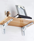 Heavy Duty Folding Shelf Brackets 2 Pack Stainless Steel Collapsible Wall Mounts Built Tough As Nails Silver 14 Inch shelf with books.