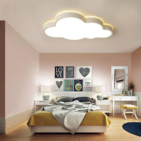 Cloud Shape LED Ceiling Light For Kids Room Acrylic Flush Mount Chandelier With Remote Dimmable Warm And White Light Large 25.5 Inch By 16 Inch Kids Bedroom Nursery Living Room Decor in a modern bedroom setting above a bed