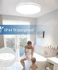 LED Flush Mount Ceiling Light 10.3 Inch 20W 5000K Daylight IP44 Waterproof Ceiling Fixture in a modern bathroom setting.