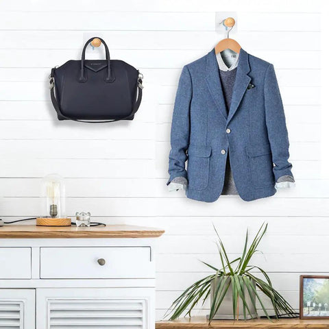 Must Have Adhesive Hat Hooks And Hangers Wall Rack Up To Eight Pounds For Baseball Caps Cowboy Hats Bucket Hats And More Eight Pack Entryway Wardrobe Organizer With Handmade Extended Wooden Pegs holding a jacket and bag.
